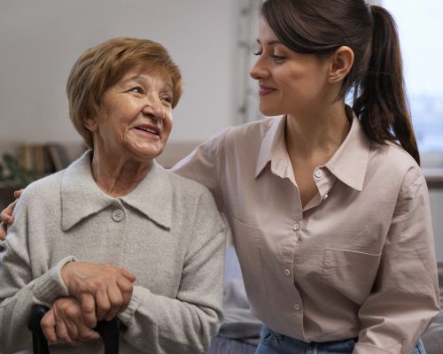 female-nurse-taking-care-elderly-person